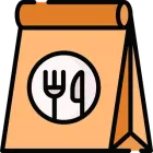 Una bolsa de papel con un tenedor y una cuchara dentro.