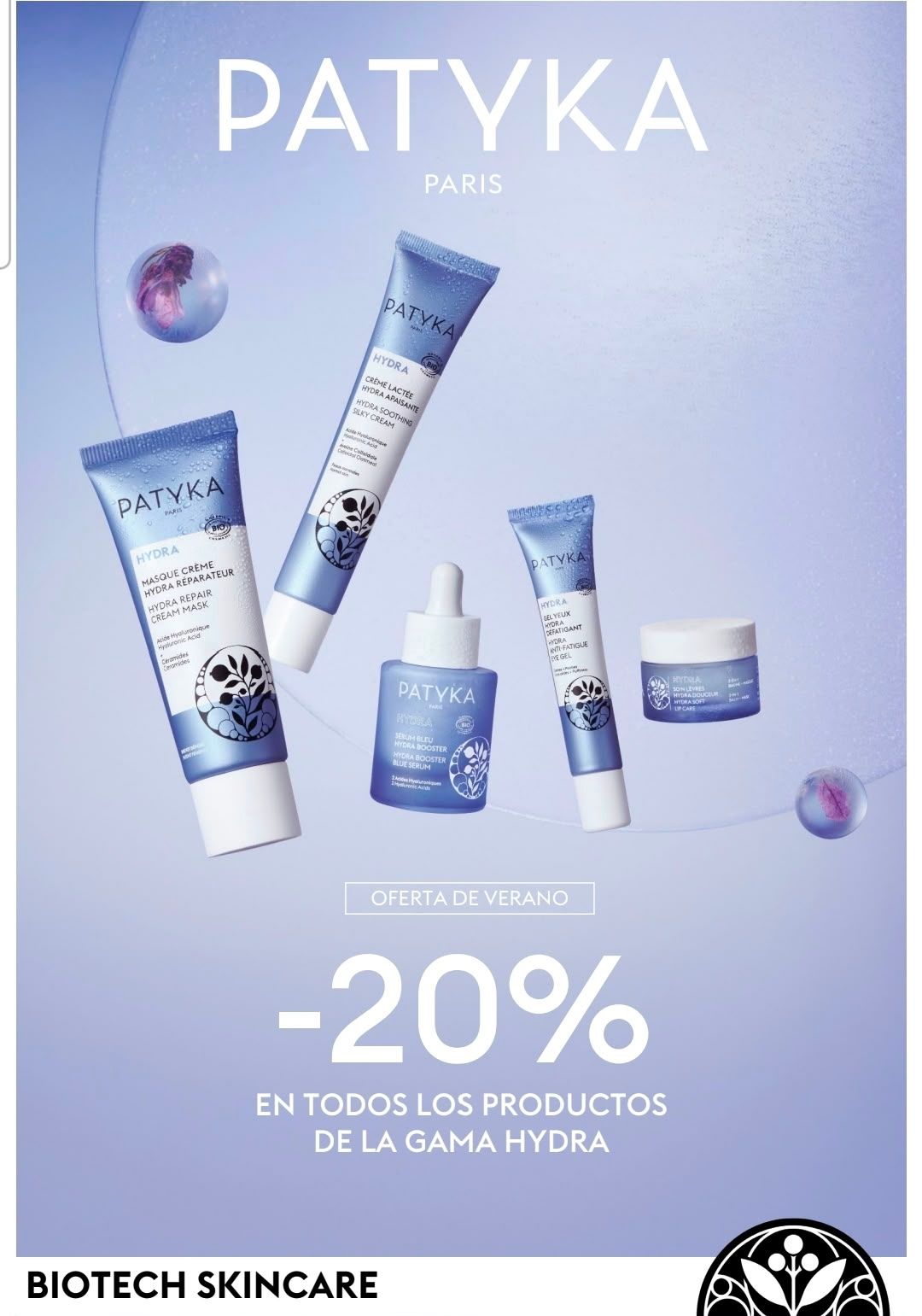 Productos para el cuidado de la piel PATYKA sobre un fondo lila claro, con botellas, tubos y una promoción de hidratación del 20%.