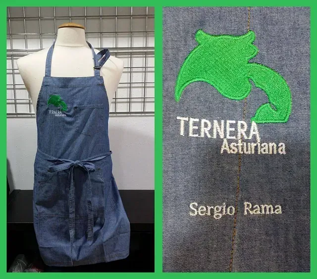 Un maniquí lleva un delantal que dice ternera asturiana