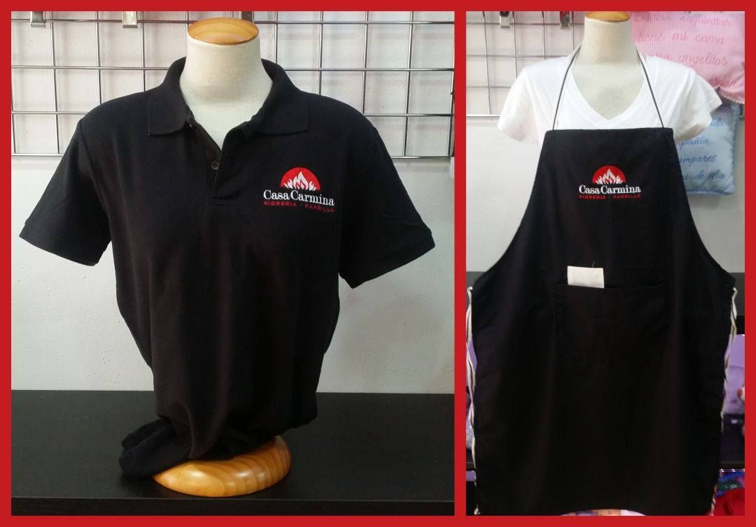 Un polo negro y un delantal sobre un maniquí.