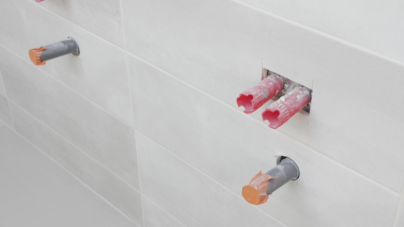 Rénovation des systèmes de plomberie dans une salle de bains