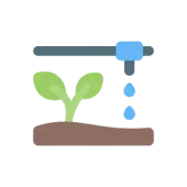 Plántula verde en suelo marrón, regada mediante sistema de riego azul.