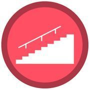 Una escalera blanca con una barandilla en un círculo rojo.