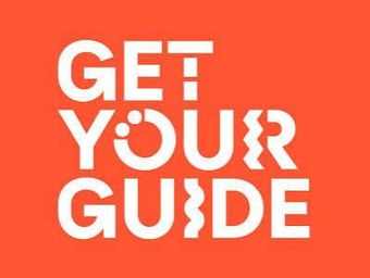 Gráfico naranja con texto blanco que dice “OBTÉN TU GUÍA”
