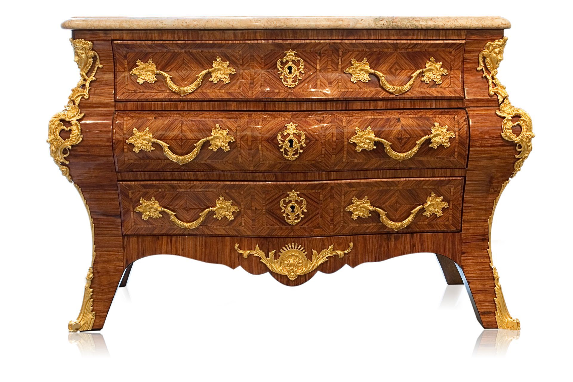 Commode galbée, bois et dorures
