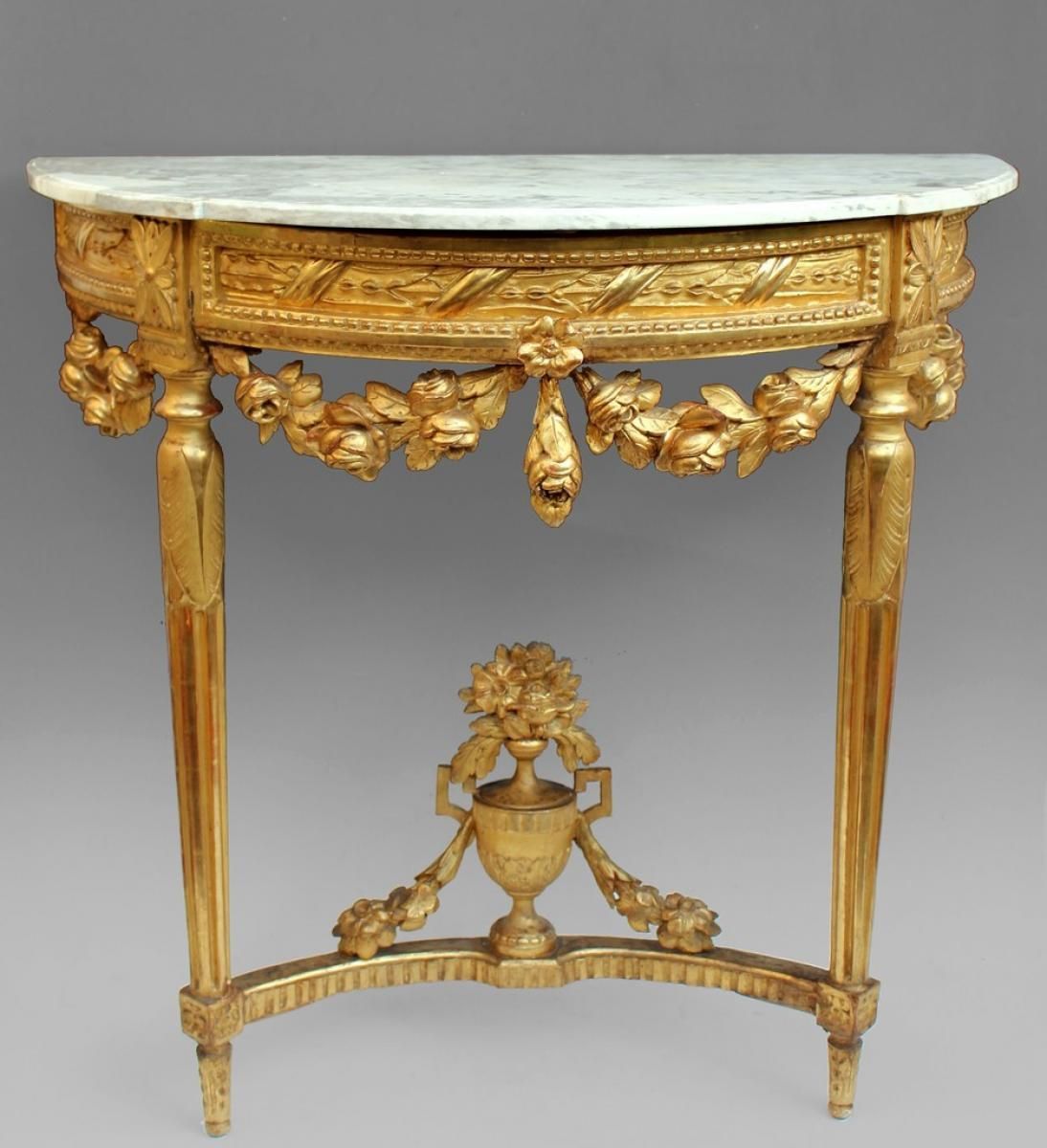 Console Louis XVI avec marbre et dorures