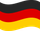 Die deutsche Flagge weht auf weißem Grund im Wind.