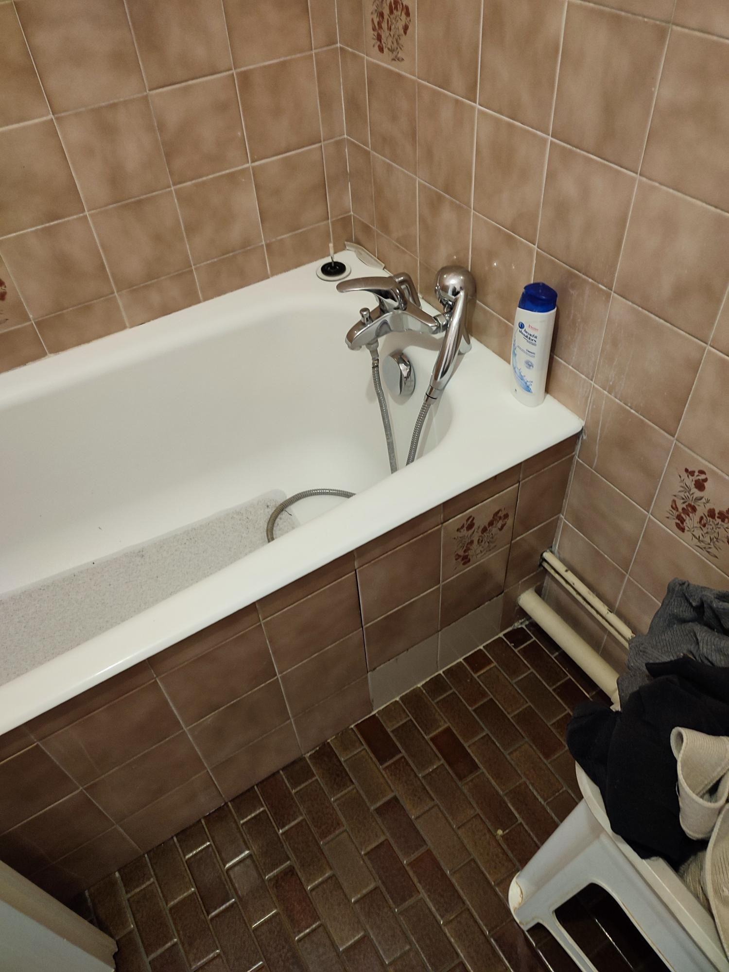 Ancienne baignoire carrelée