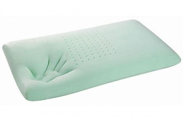 Almohada de espuma viscoelástica verde menta con superficie texturizada con hoyuelos.
