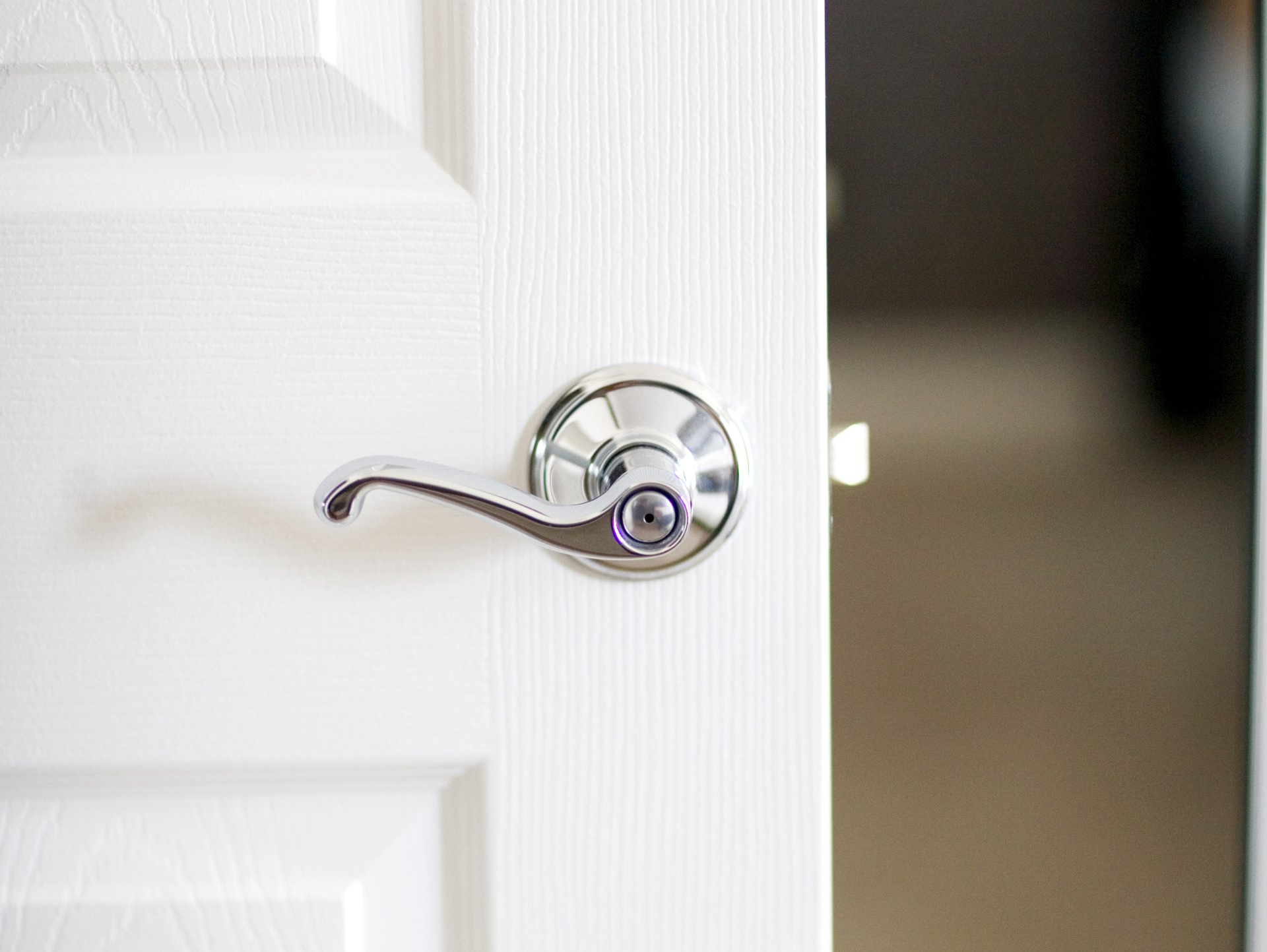 Poignet de porte blanche