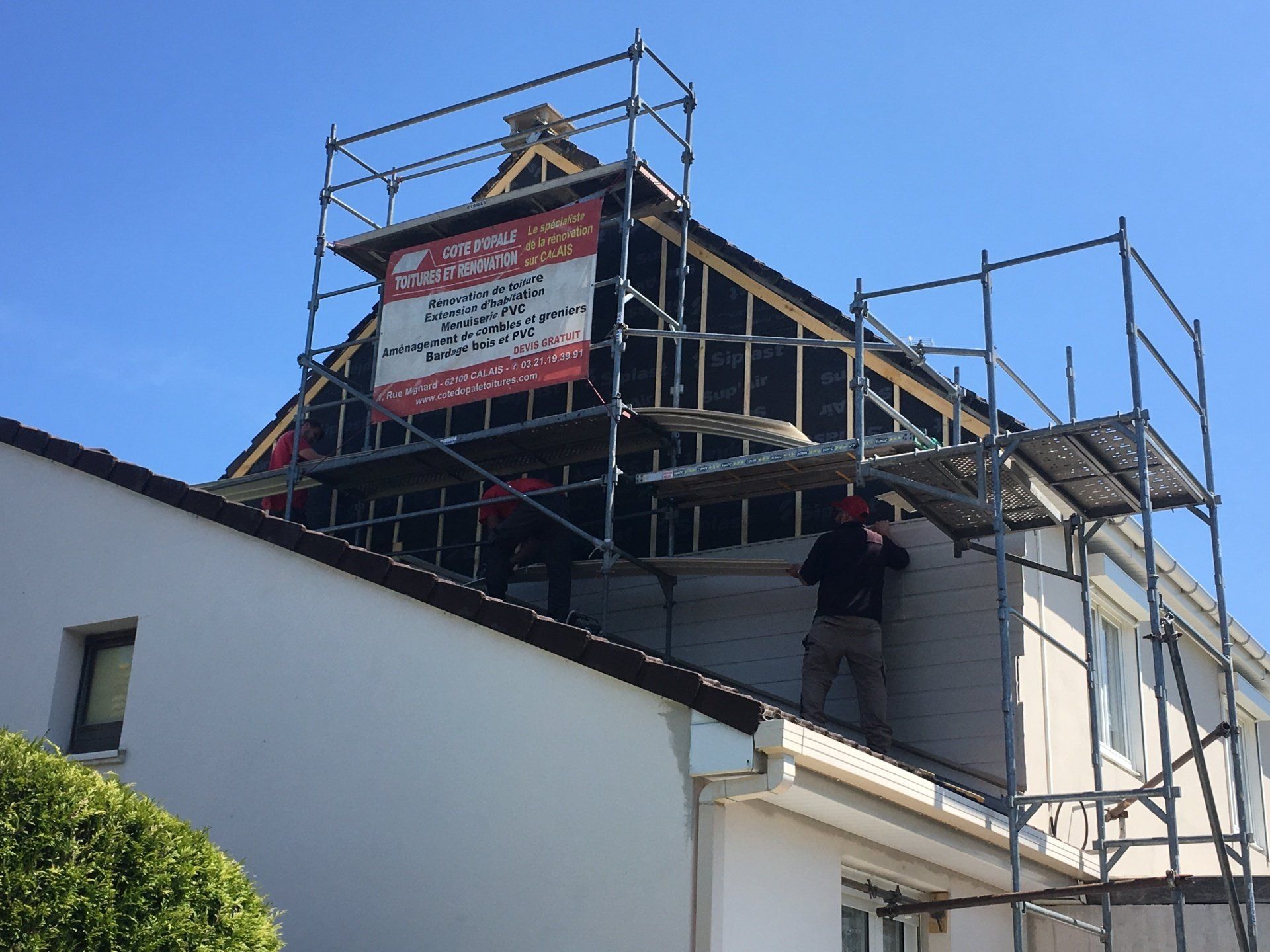 Travaux de pose de bardage