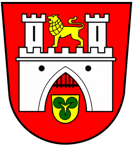 Ein rot-weißes Wappen mit einem Löwen auf einer Burg