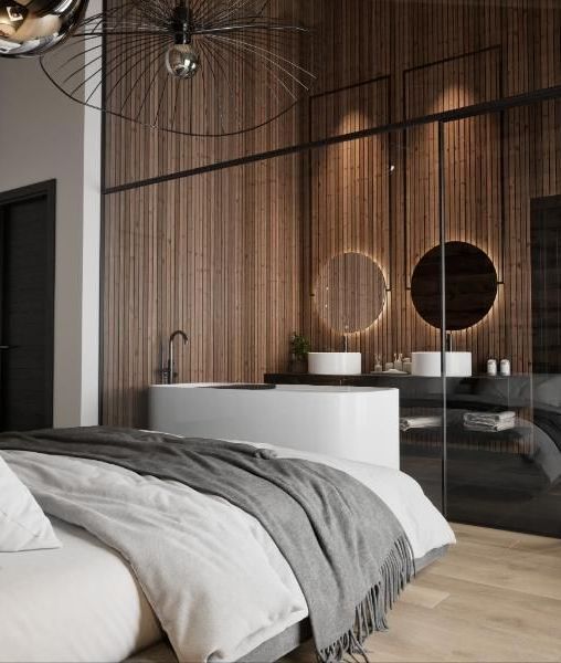 Une chambre avec un lit, un lavabo, un miroir et une baignoire.