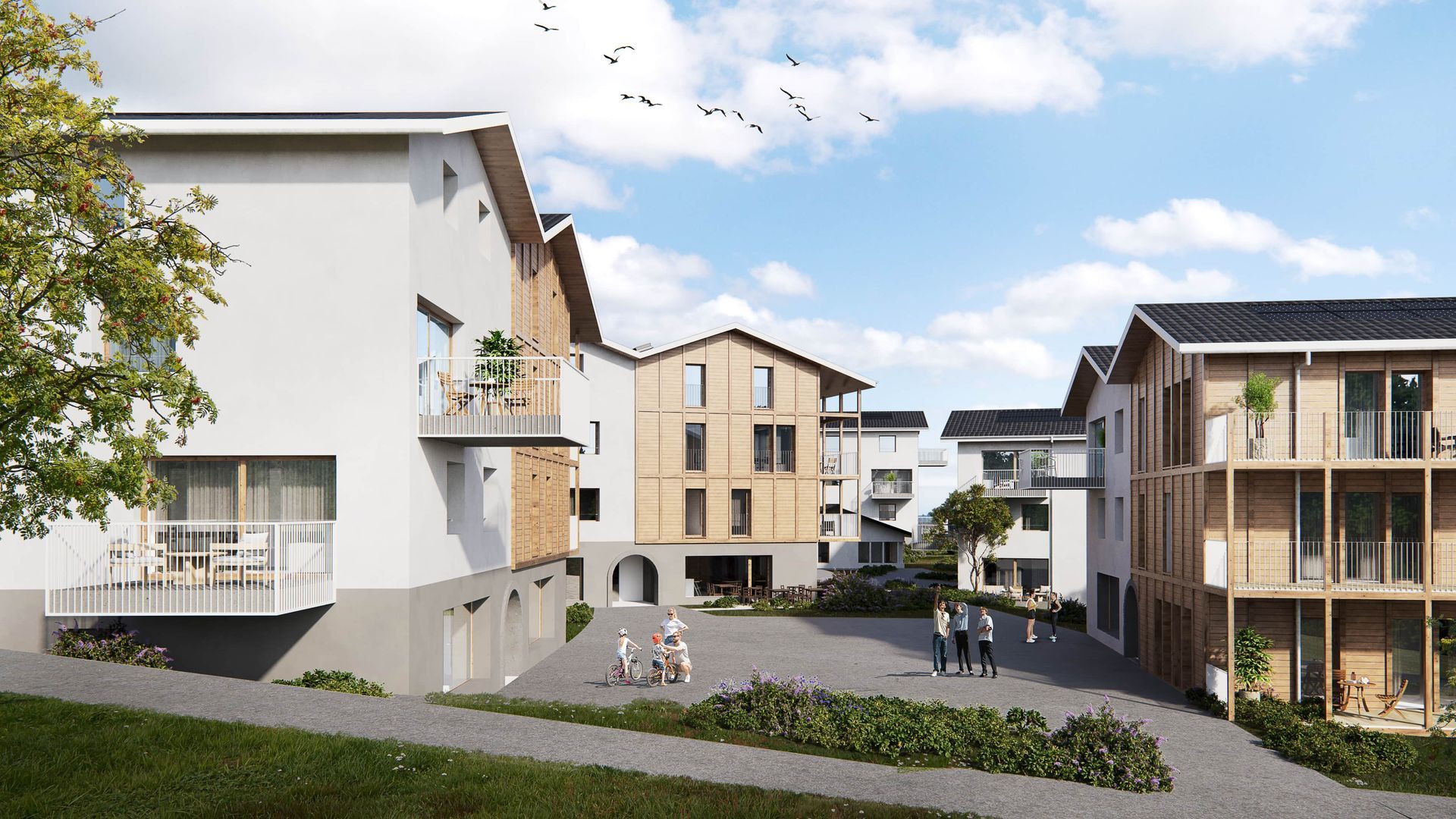 Immeubles modernes à plusieurs étages avec des éléments en bois ; des gens se promènent dans la cour.