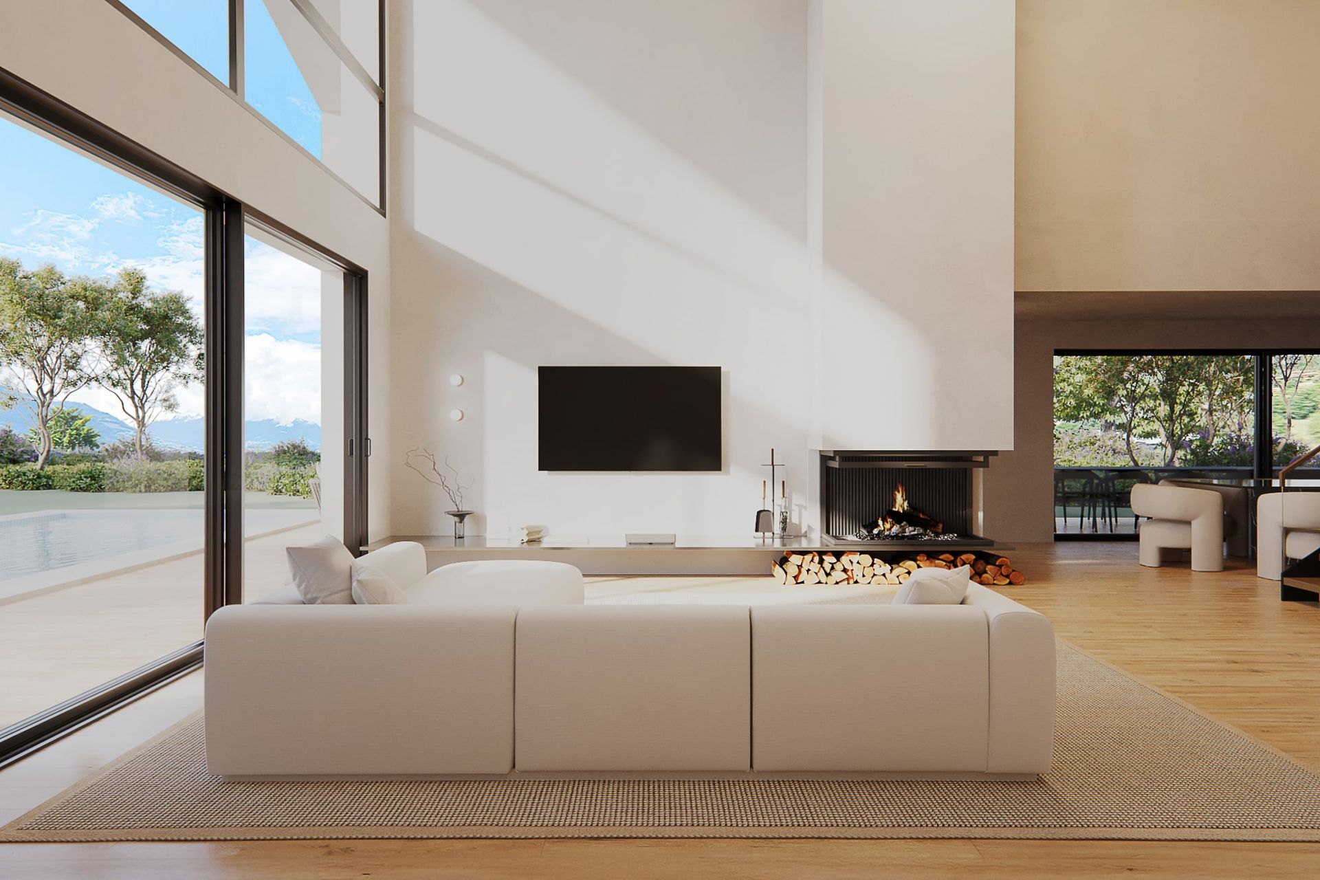 Salon moderne avec de grandes fenêtres, canapé crème, cheminée et télévision.