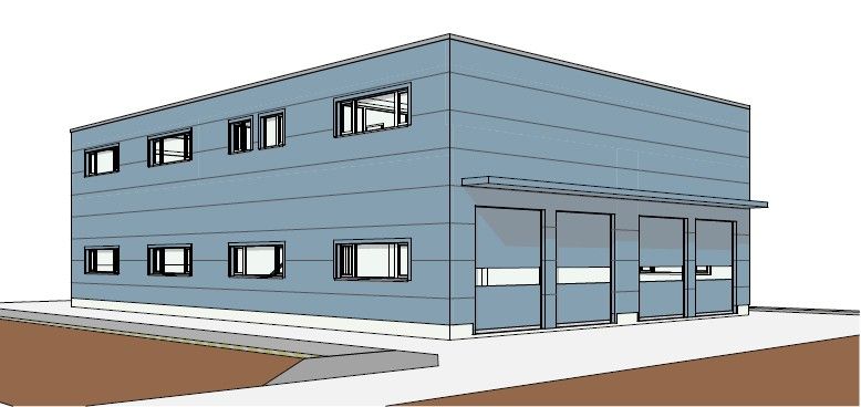 Bâtiment industriel bleu avec fenêtres, portes de garage et petite rampe.