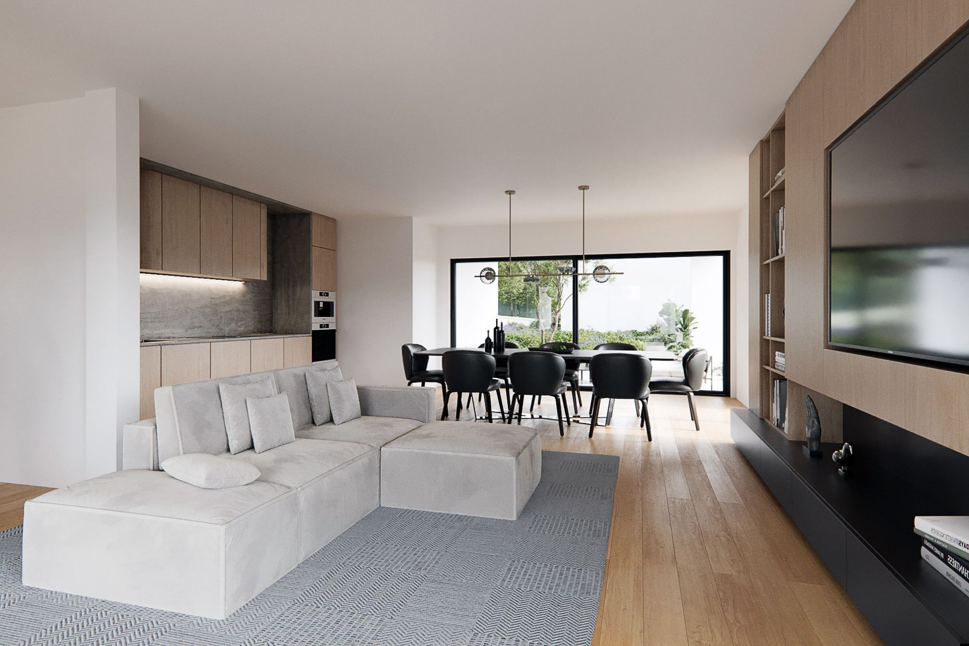 Salon moderne avec un canapé d'angle gris, une table à manger et une grande télévision.