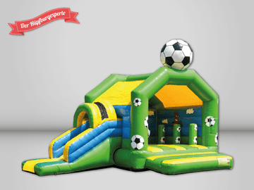 Der Hüpfburgexperte grün, blau, gelbe Hüpfburg mit Rutsche, im Fußball Design.
