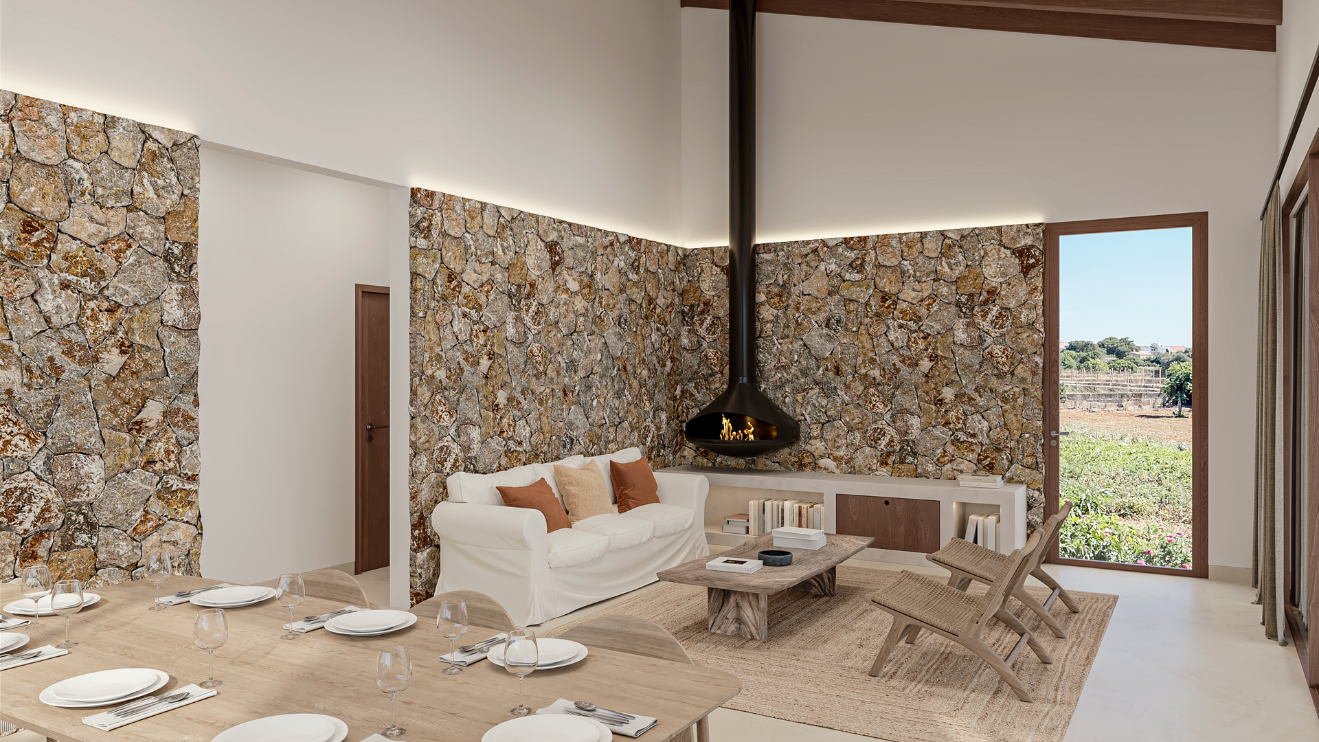 Una sala de estar con sofá, mesa y chimenea.