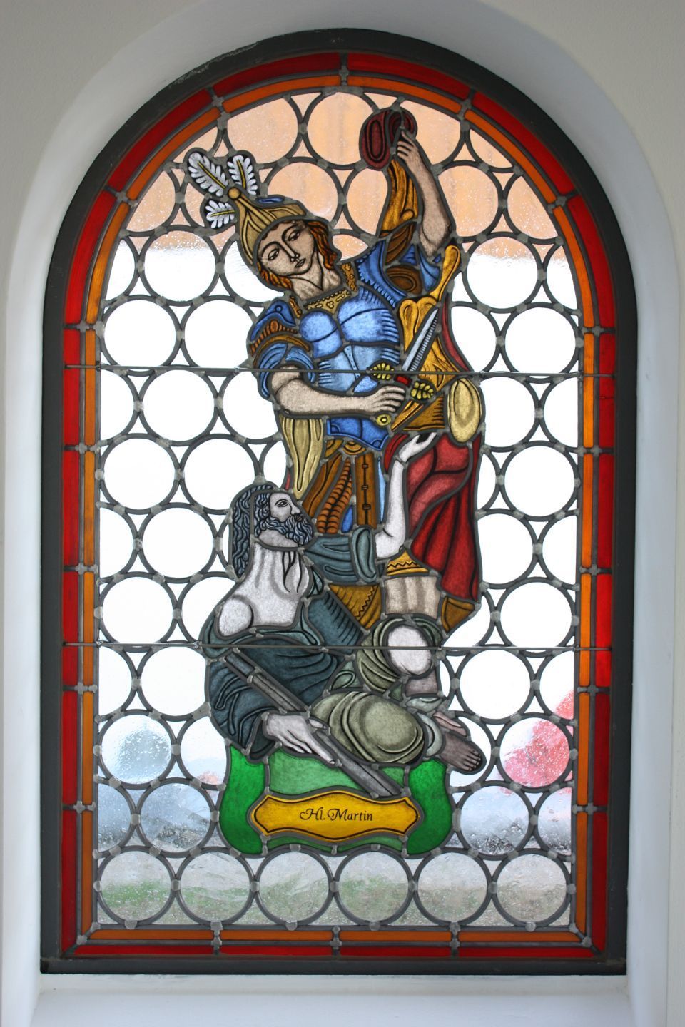 Glasmalerei mit biblischem Motiv auf einem Kirchenfenster