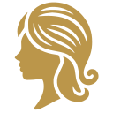 Silueta dorada del perfil de una mujer con el cabello suelto, con un estilo que recuerda a un logotipo sobre un fondo blanco.