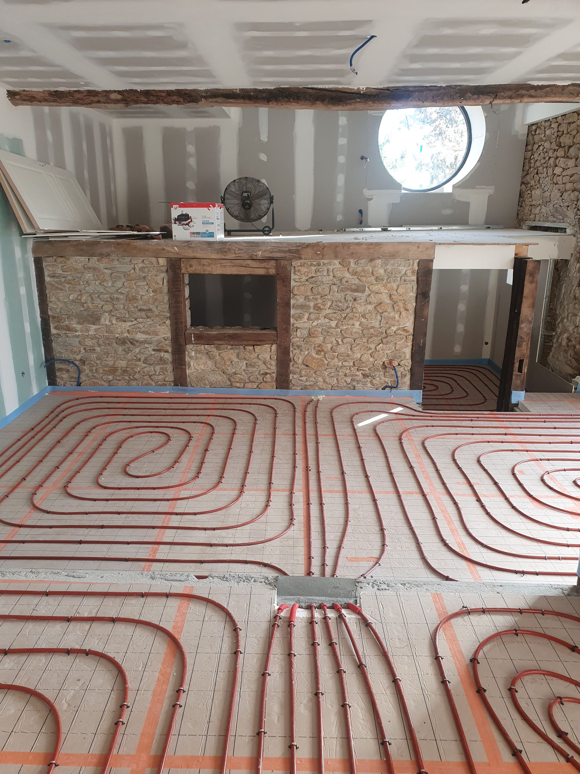 Plancher chauffant sur un muret en pierre