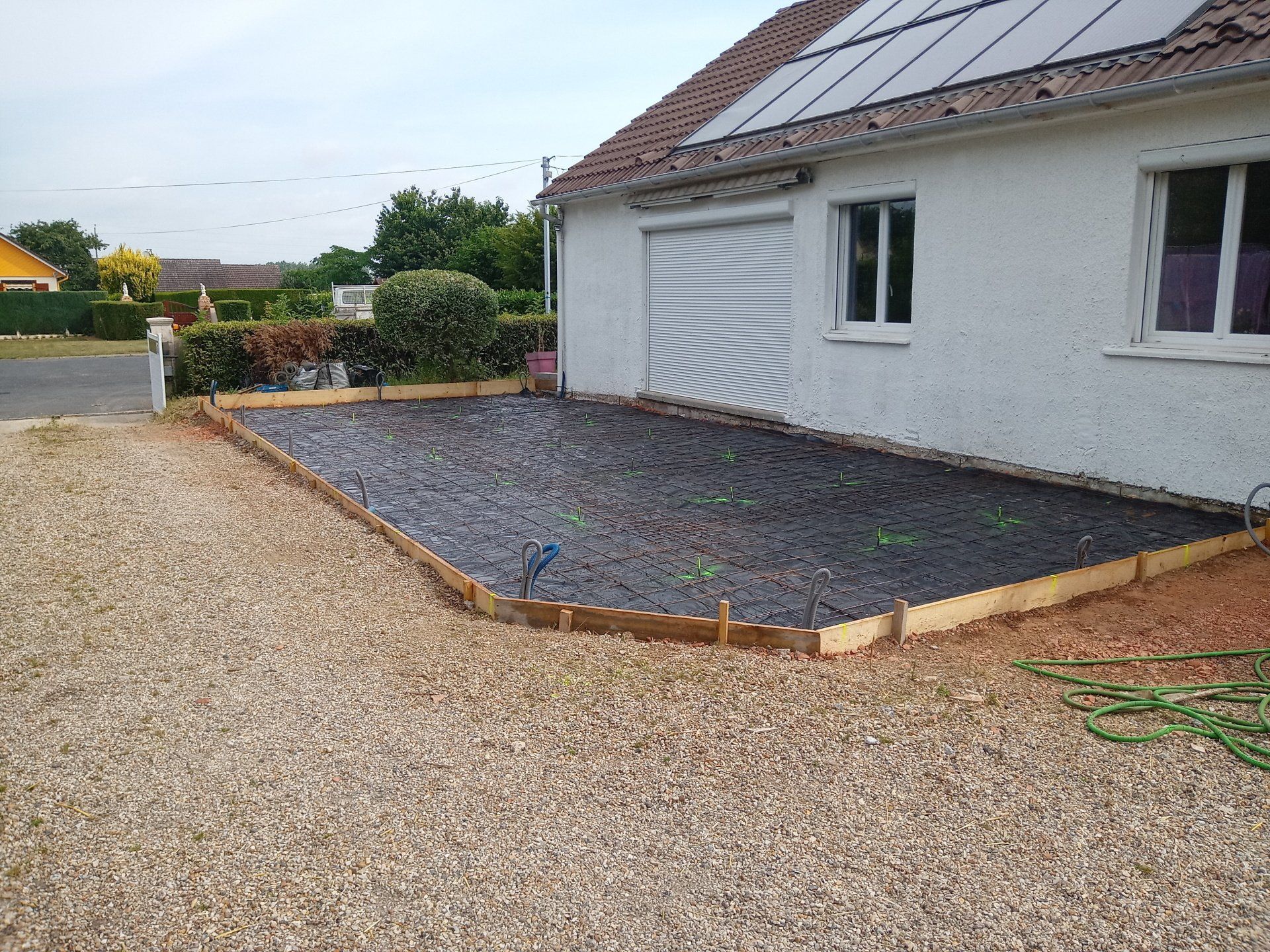 Travaux de pose de dalle de béton