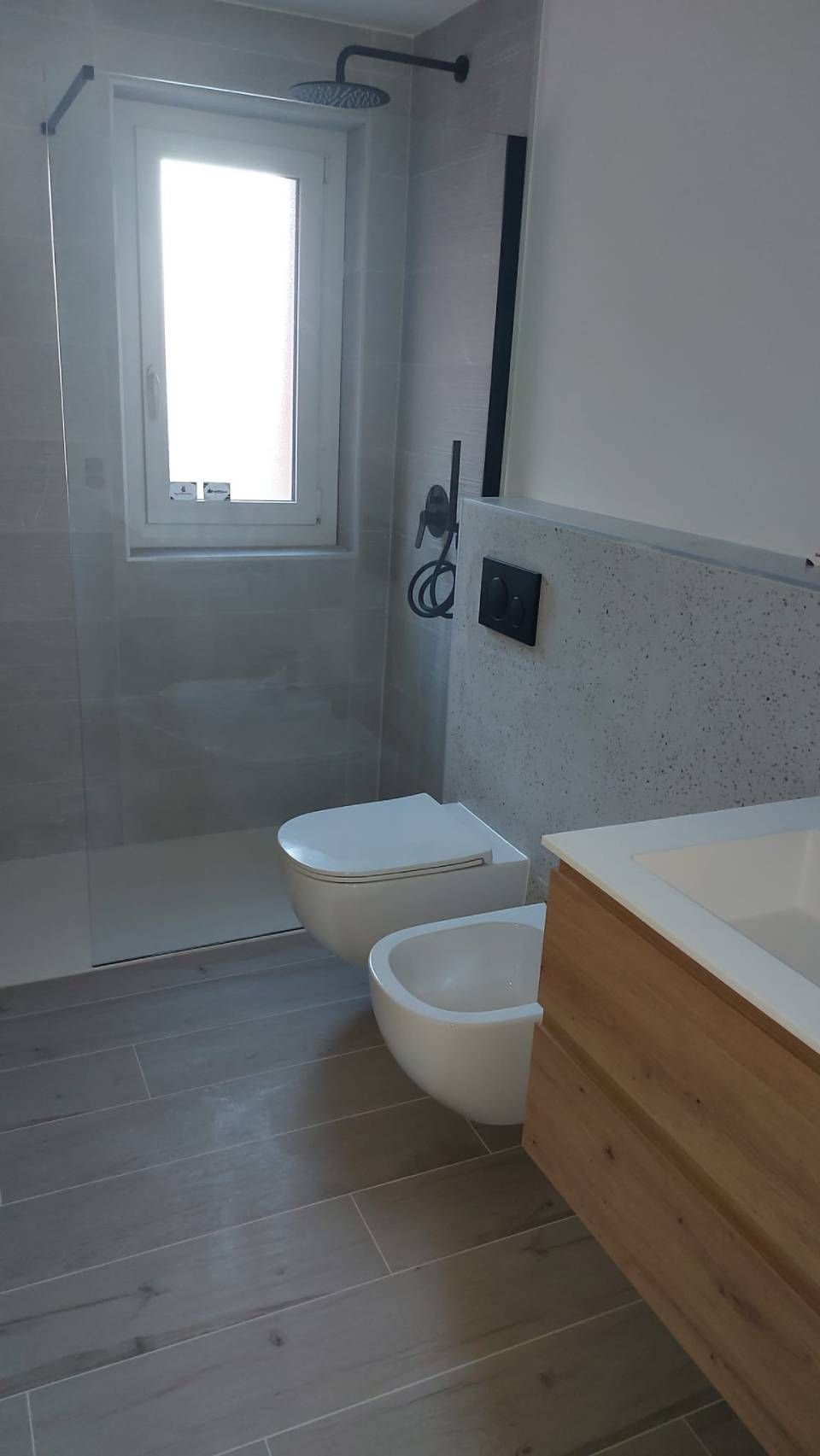 Posa piastrelle e rifacimento bagni - Kellici