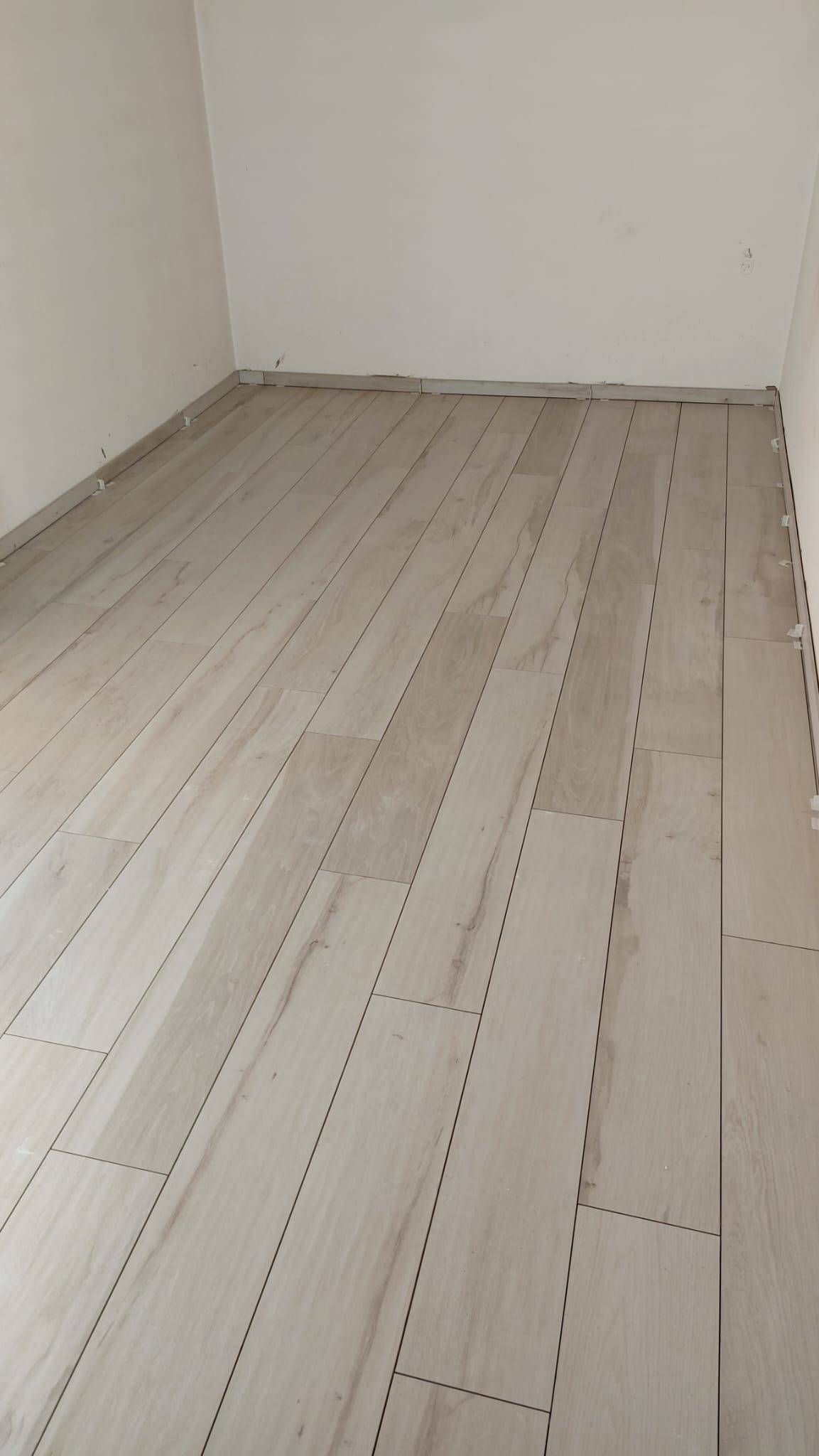 Posa piastrelle - Kellici