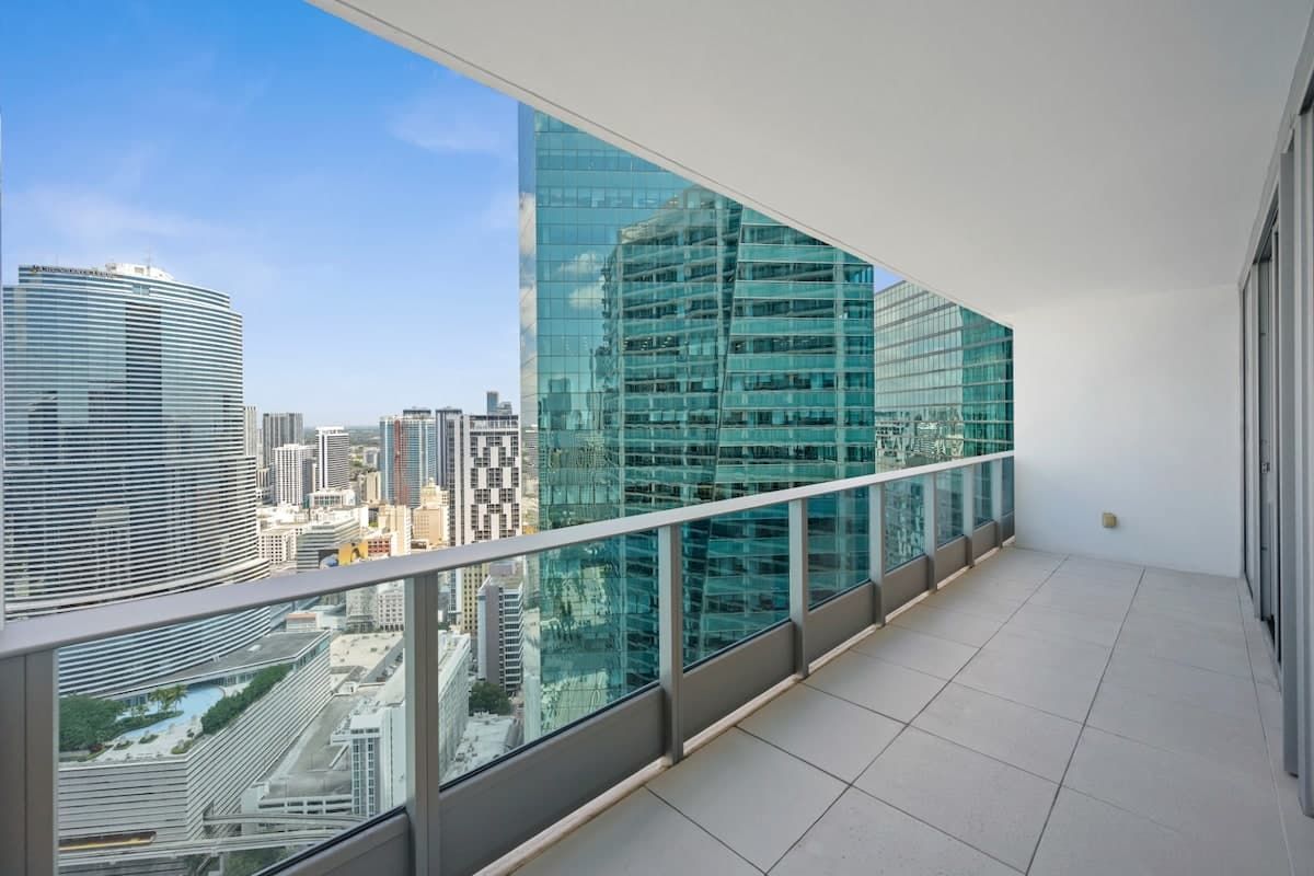 An balcony with a view of a city of Miami