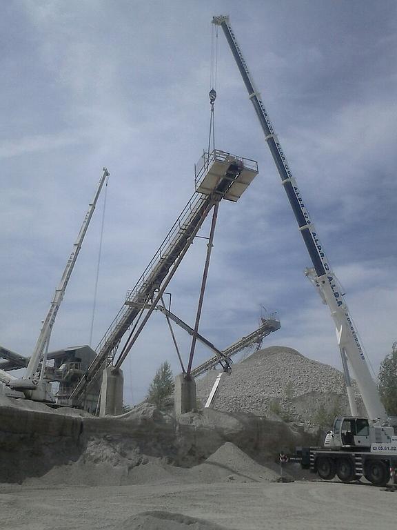 Levage d'un convoyeur à 2 grues
