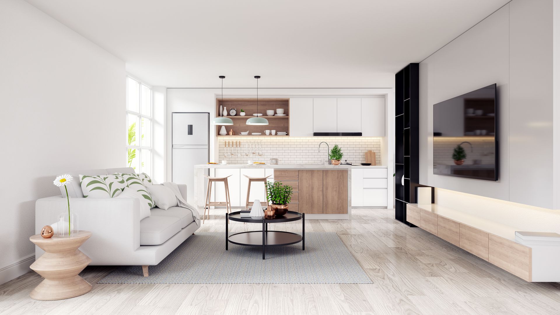 Espacio habitable moderno con paredes blancas, cocina y sala de estar, pisos de madera clara