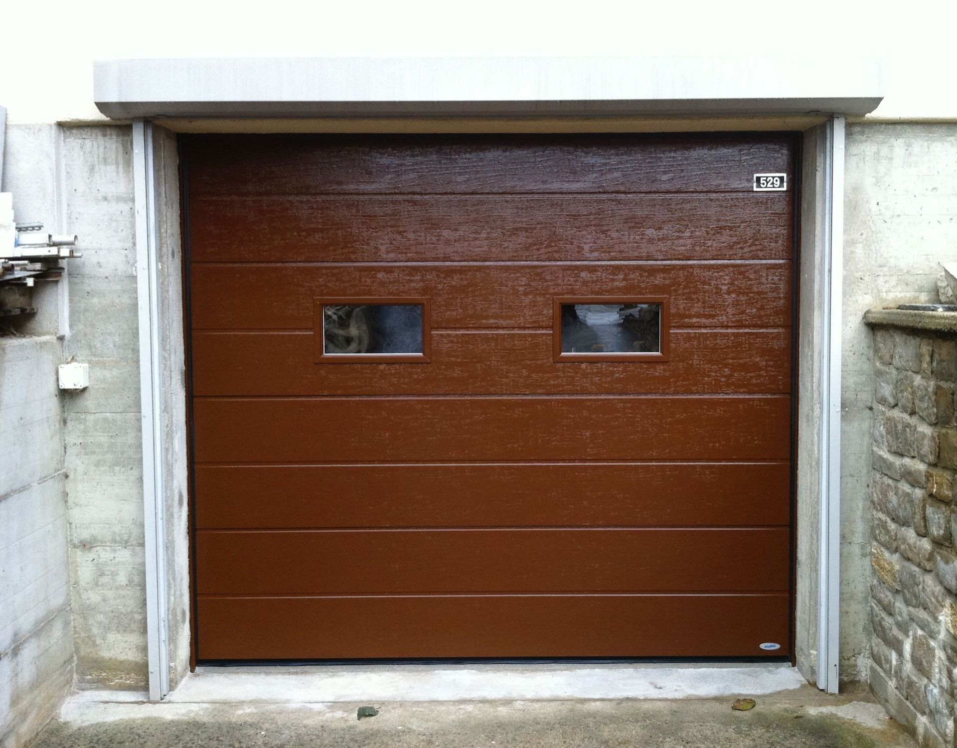 Porte de garage - All Security Store Sarl