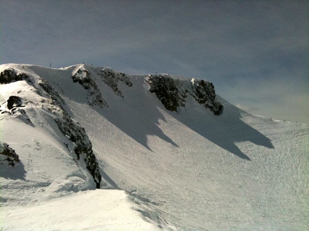 Large snow covered cliff at Palisades Ski Resort