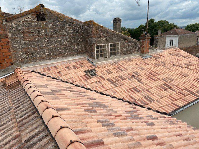 Réfection d'une couverture pose de tuiles
