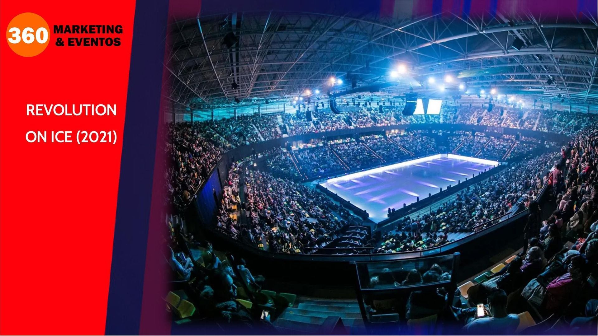 Arena con pista de hielo y público, evento iluminado con luces azules y violetas.