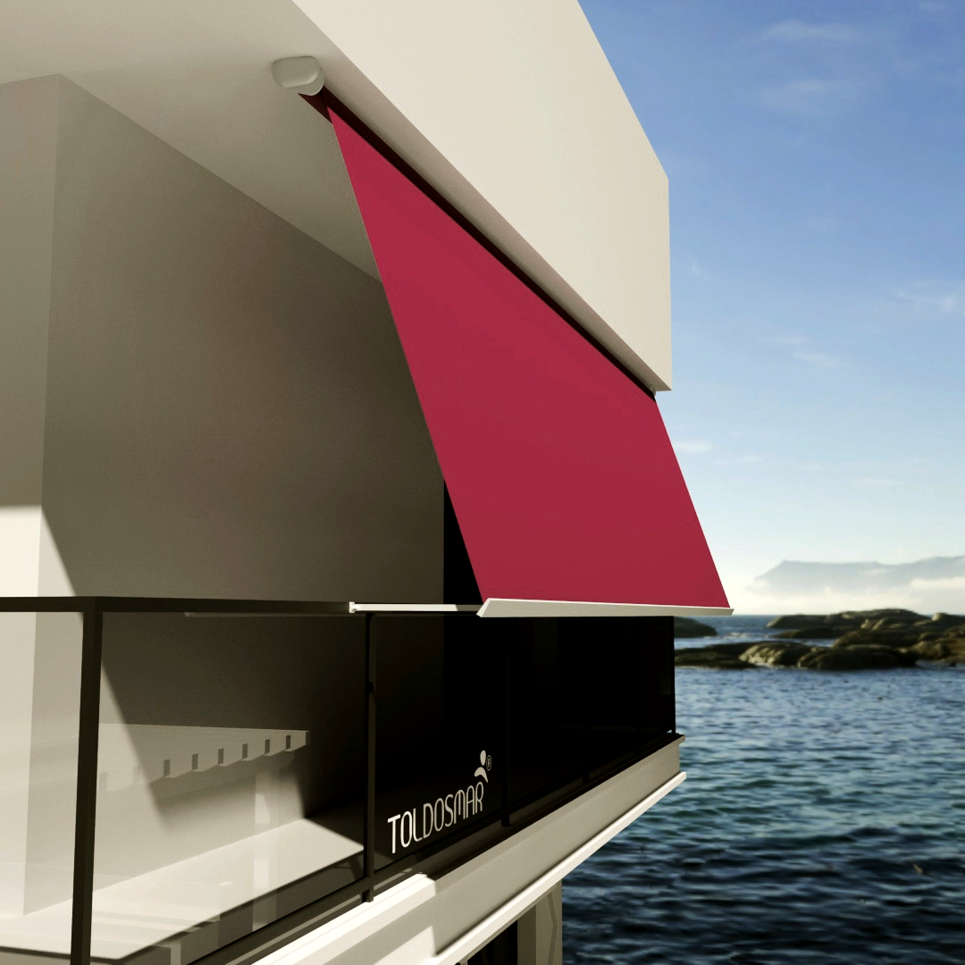 Un balcón con un toldo rojo que dice Toulouse.