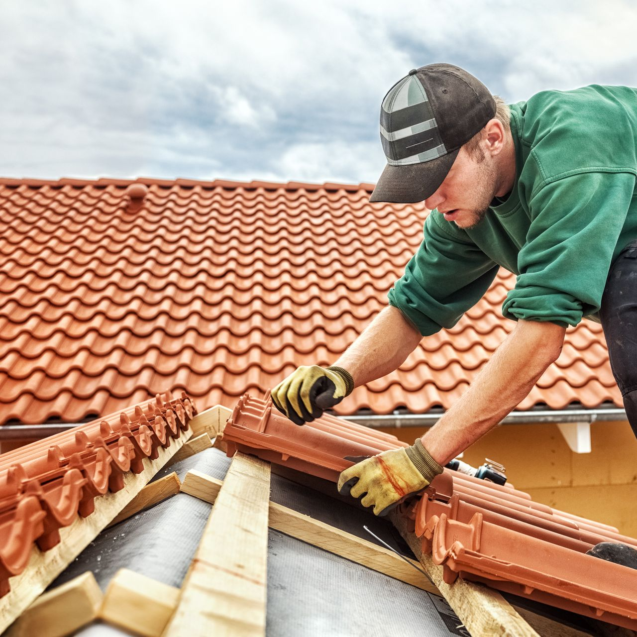 Pose de tuiles mécaniques
