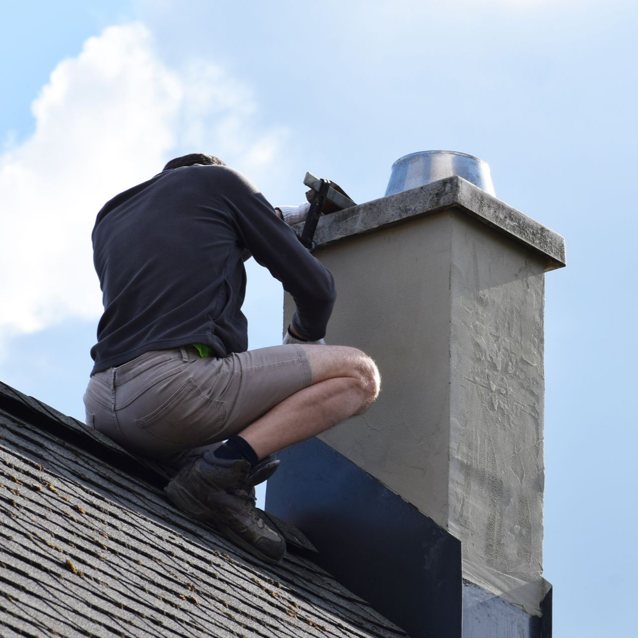Pose d'un abergement de cheminée