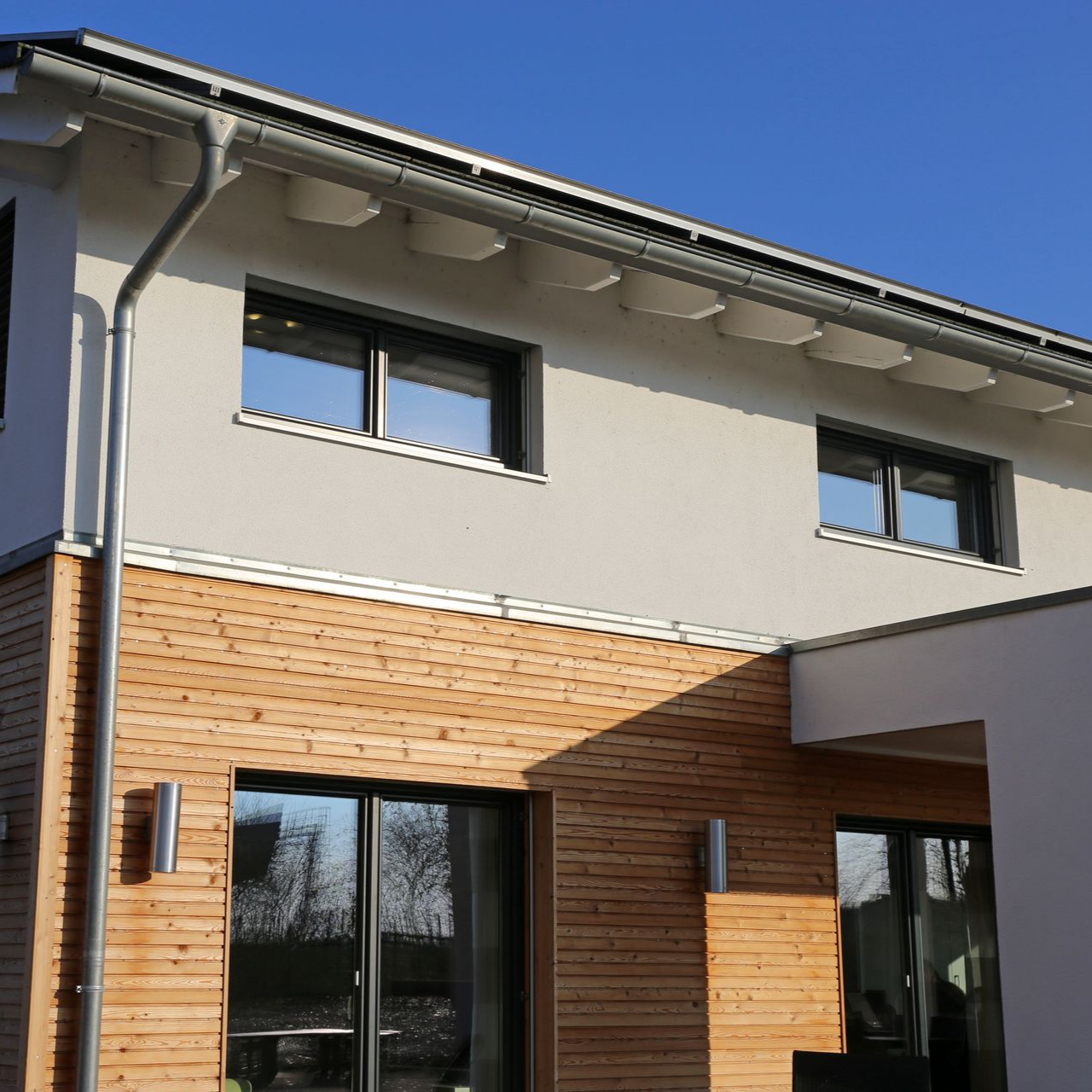 Bardage en bois sur une façade de maison