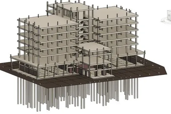 3D model of a multi-story building framework with columns and foundation piles on a brown site base