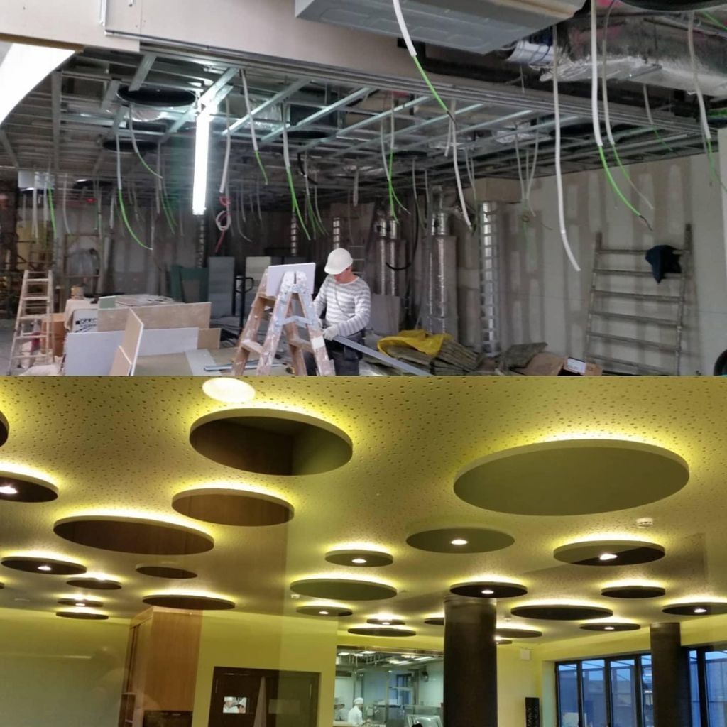 Arriba: Interior de una obra con cableado a la vista y un trabajador. Abajo: Techo terminado con luces circulares.