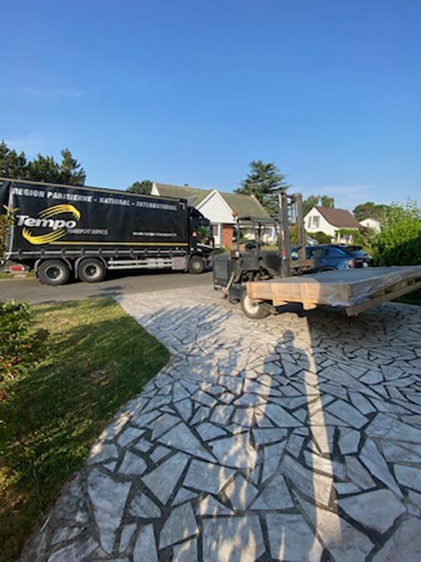 Livraison d'un gros colis en palette chez un particulier