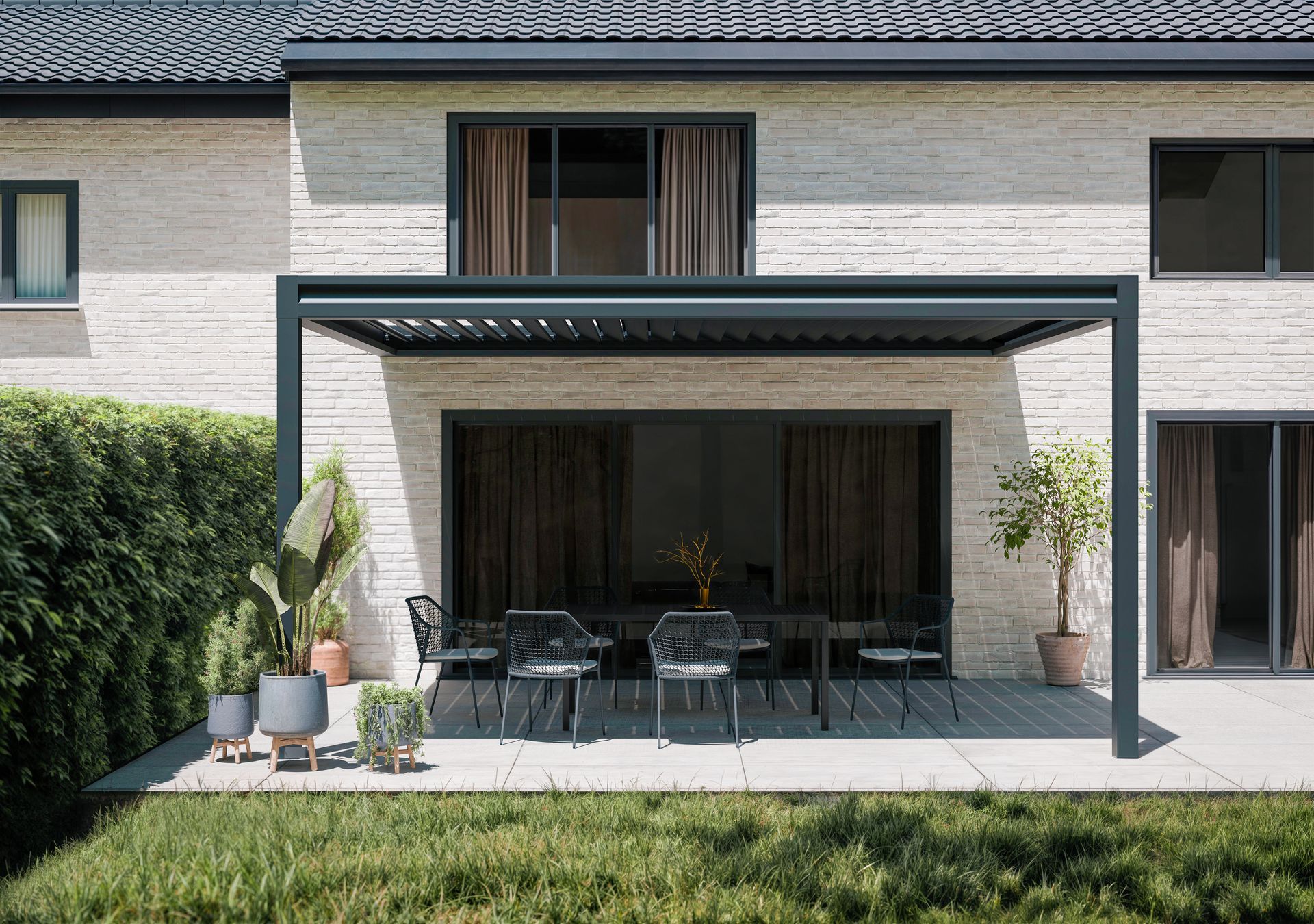 Une pergola assosée à une maison.