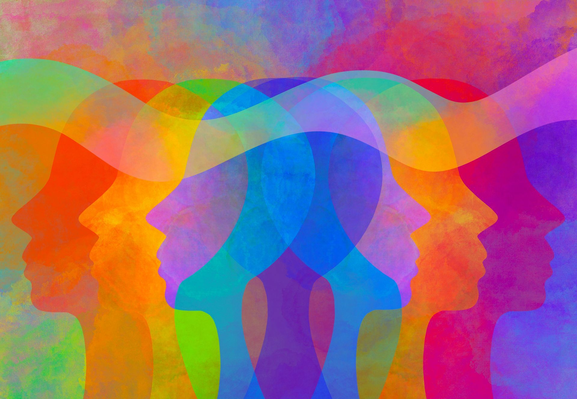 Silhouettes colorées et superposées de profils humains. Représentation abstraite et multicolore de l'esprit.