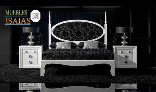 Un dormitorio con una cama y mesitas de noche y un cartel que dice muebles isaias