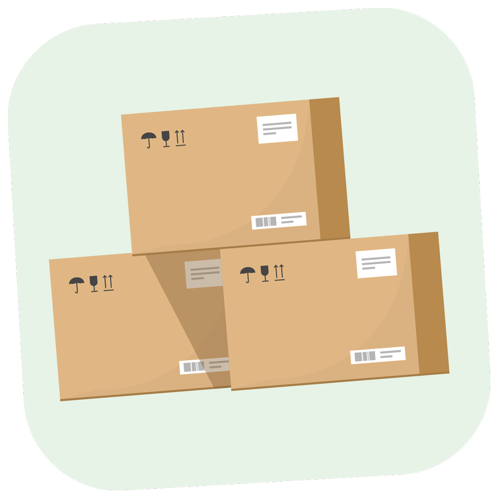 Trois cartons empilés avec des étiquettes d'expédition et des symboles « fragile ».