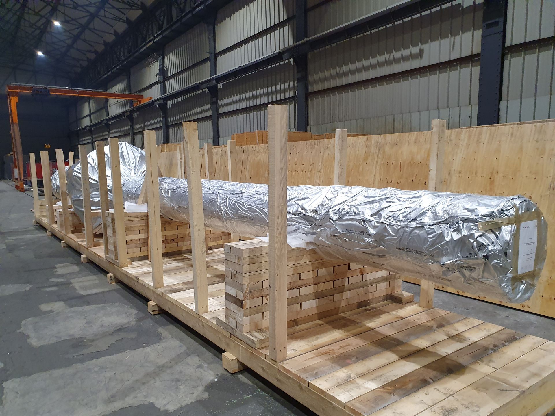 Conditionnement en bois pour grande pièce industrielle