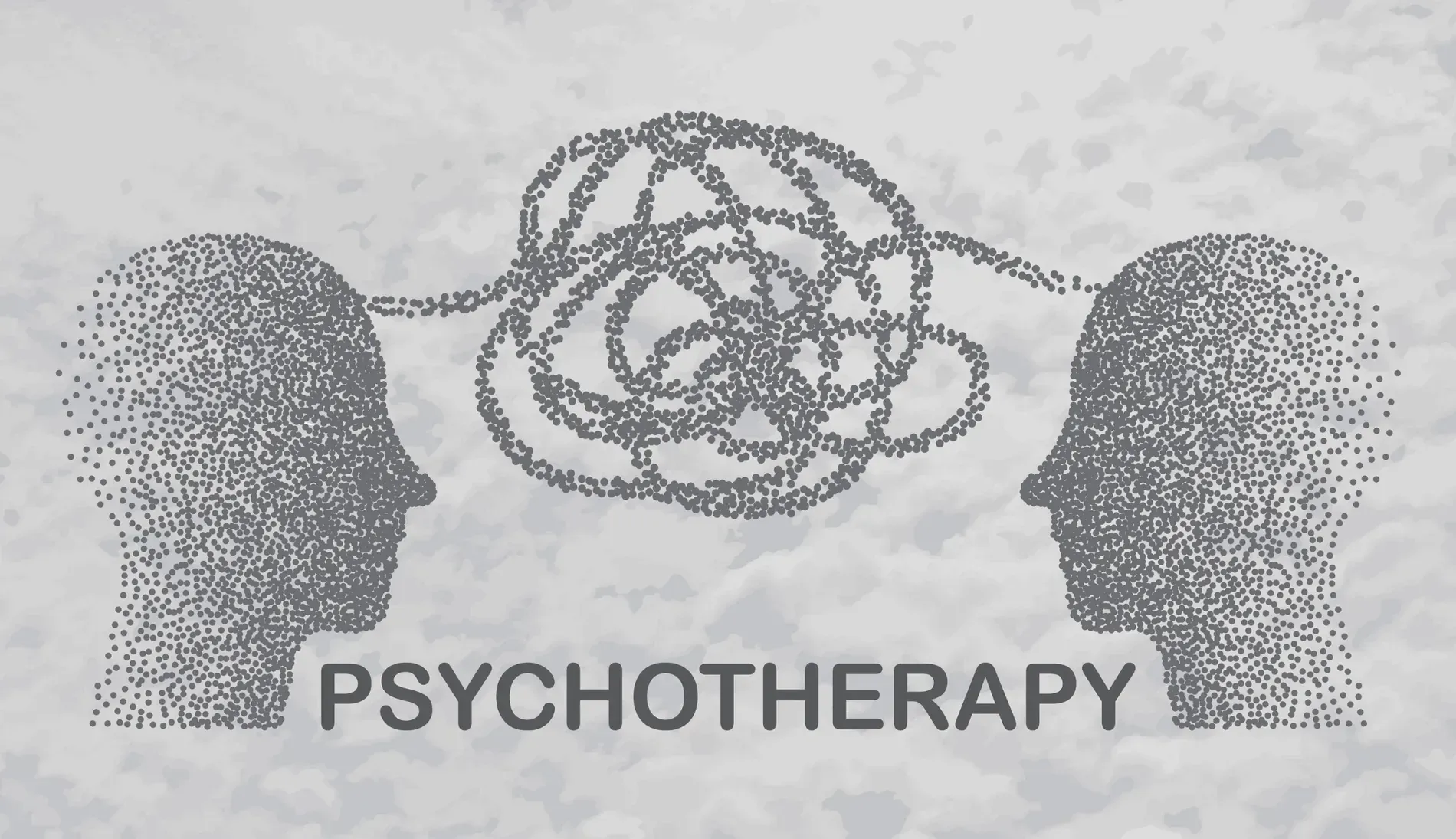 Mujer y niño en sesión de terapia con terapeuta, en el interior.