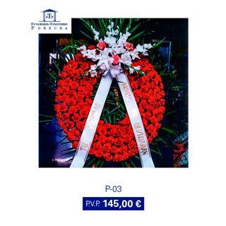 Corona floral roja con cinta blanca y flores, precio de 145 euros.